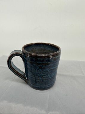 Blue and brown glazed studio pottery mug
